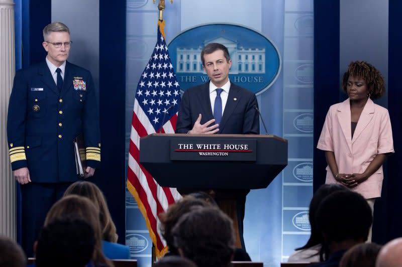 U.S. Secretary of Transportation Pete Buttigieg (C) Deputy Commandant for Operations for the United States Coast Guard, Vice Admiral Peter Gautier (L) and White House Press Secretary Karine Jean-Pierre (R) participate in a news conference in the James Brady Press Briefing Room of the White House on Wednesday. Photo by Michael Reynolds/UPI
