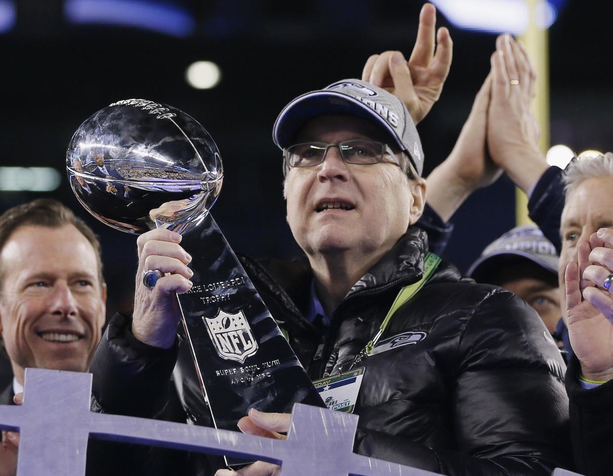 Allen in 2011 with his Super Bowl team the Seattle Seahawks. His fortune enabled him to indulge in an array of pursuits, including investment in sports teams and a film studio: Getty
