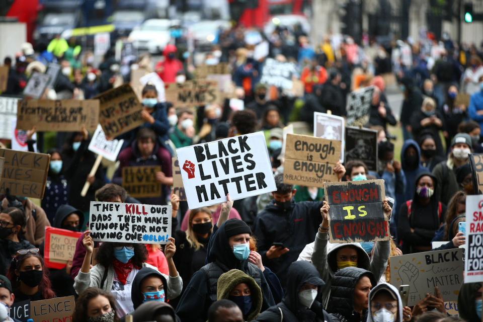 LONDON, UNITED KINGDOM - JUNE 06: Protesters march through central London on June 6, 2020 in London, United Kingdom. The death of an African-American man, George Floyd, while in the custody of Minneapolis police has sparked protests across the United States, as well as demonstrations of solidarity in many countries around the world. (Photo by Hollie Adams/Getty Images)