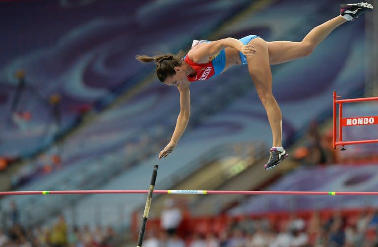 Russia's Yelena Isinbayeva competes in the women's pole vault final at the 2013 IAAF World Championships at the Luzhniki stadium in Moscow on August 13, 2013. Isinbayeva won the gold medal