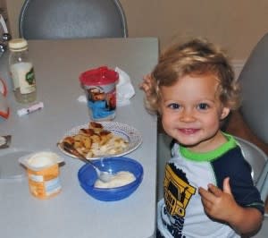 Liza's son Luca with some of his favorite snacks