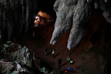 Rescue workers are seen in Tham Luang caves during a search for 12 members of an under-16 soccer team and their coach, in the northern province of Chiang Rai, Thailand, June 27, 2018. REUTERS/Soe Zeya Tun