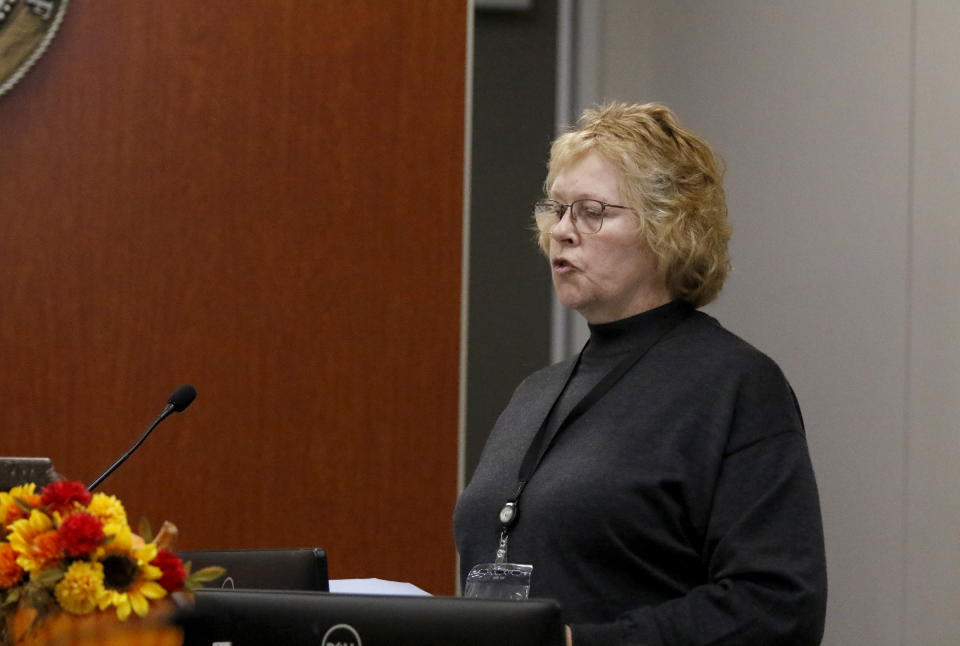 The court clerk reads the verdict in Monterey County Superior Court in Salinas, Calif on Tuesday, Oct. 18, 2022, after a jury found Paul Flores guilty of murdering Cal Poly student Kristin Smart. (Laura Dickinson/The Tribune via AP, Pool)