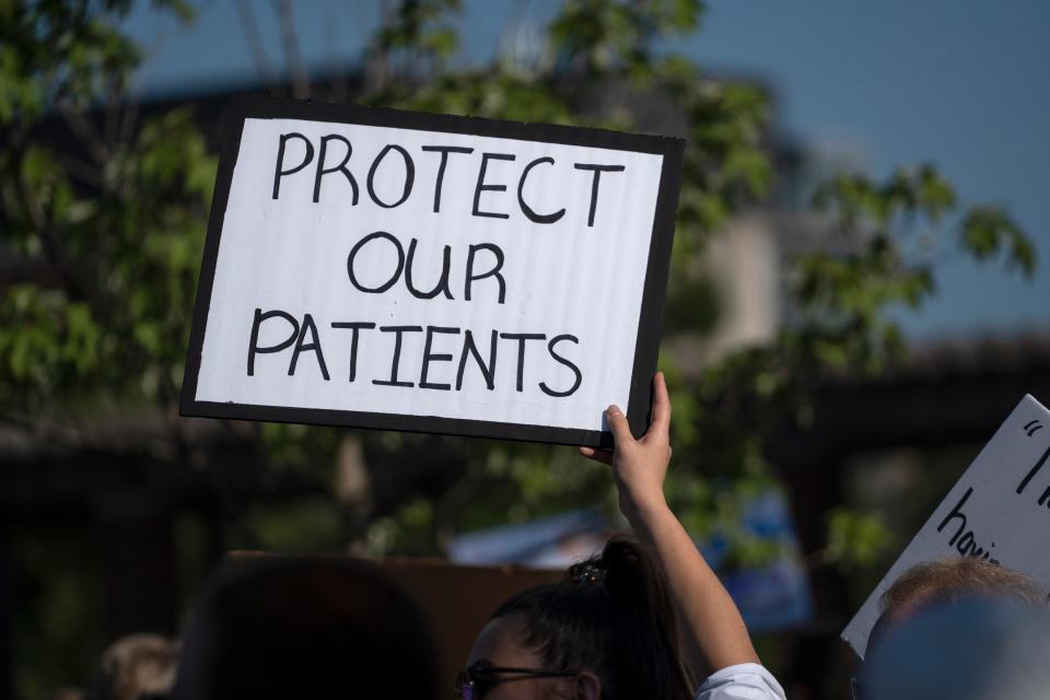 Medical professionals joined others during the Reproductive Justice Rally, Wednesday, June 29, 2022 on the IUPUI campus.
(Photo: Kelly Wilkinson/IndyStar)