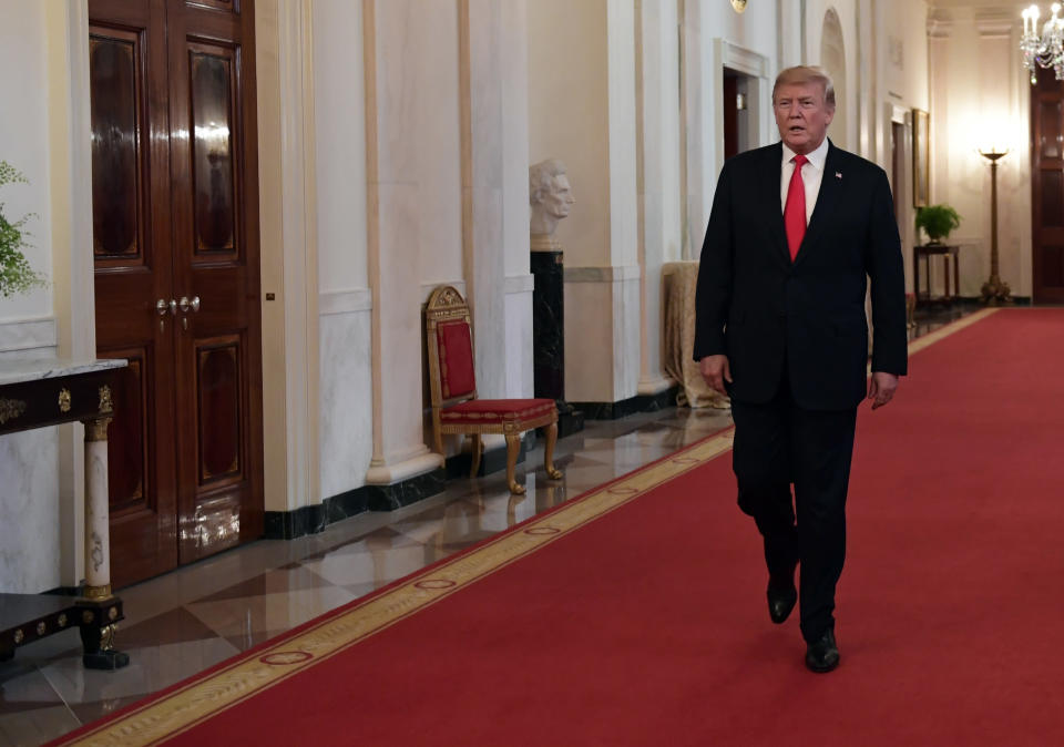 <p> FILE - In this Wednesday, Sept. 12, 2018 file photo, President Donald Trump arrives to speak at a Congressional Medal of Honor Society reception in the East Room of the White House in Washington. Trump is going ahead with plans to announce new tariffs on about $200 billion of Chinese imports, The Wall Street Journal reported Saturday, Sept. 15, 2018. (AP Photo/Susan Walsh) </p>