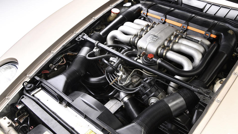 The 928 packs a 4.5-liter V-8 that can churn out 219 horses. - Credit: Barrett-Jackson