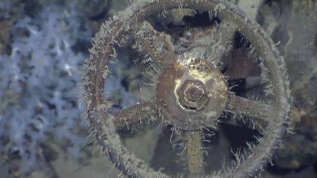 A wheel on a valve from a lower engineering area on the sunken Japanese warship Musashi, one of the largest battleships ever built, is seen in an undated handout image from a team led by Microsoft co-founder Paul Allen off the coast of the Philippines in the Sibuyan Sea released March 4, 2015. REUTERS/Paul G. Allen/Handout via Reuters
