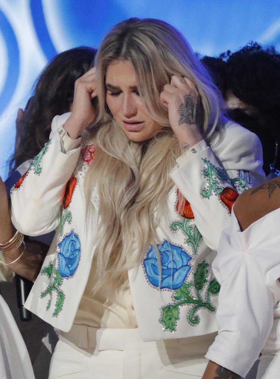 By the end of Kesha’s performance of “Praying” at the 60th Grammy Awards, emotions were running high. (Photo: REUTERS/Lucas Jackson)