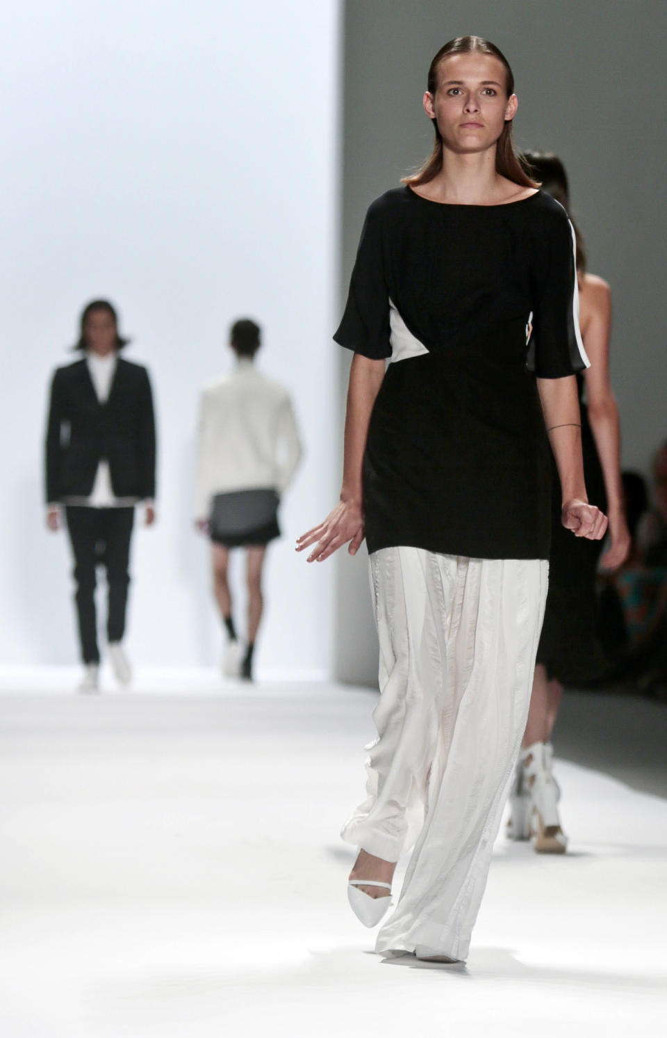 Fashion from the Richard Chai Spring Summer 2014 collection is modeled on Thursday, Sept. 5, 2013, during Fashion Week in New York. (AP Photo/Bebeto Matthews)