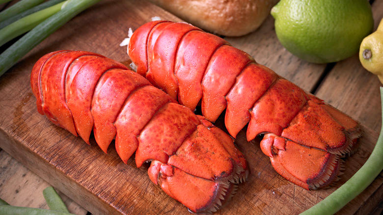 Cooked lobster tails on wood