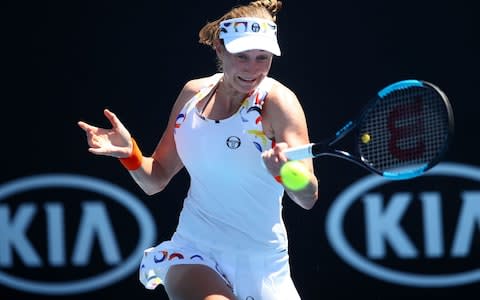 Ekaterina Makarova of Russia plays a forehand in her first round match against Katie Boulter  - Credit: Getty