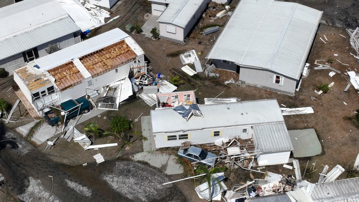 Damage to a trailer park is seen after Hurricane Ian passed by the area Saturday, Oct. 1, 2022, in Fort Myers, Fla. 