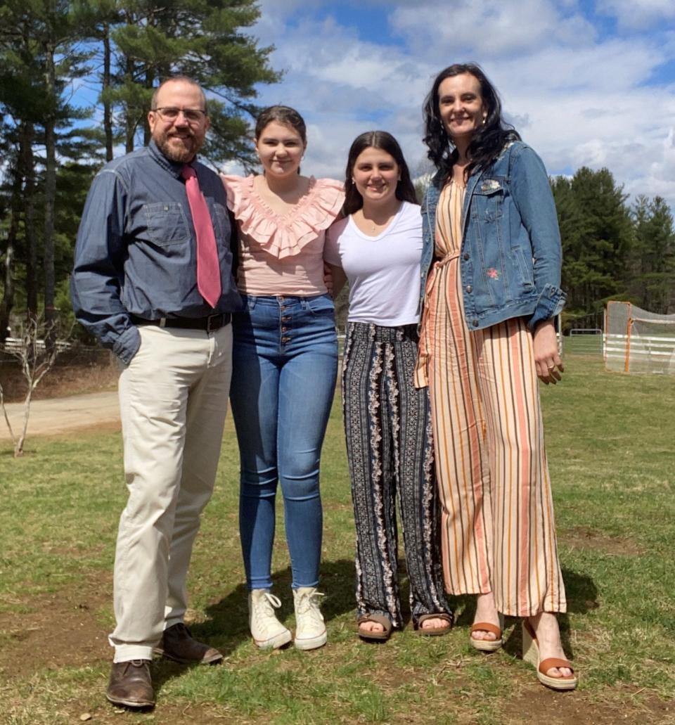 Bob Hoffman  with his daughters Katrina, 16, Malina, 13, and wife Amanda.