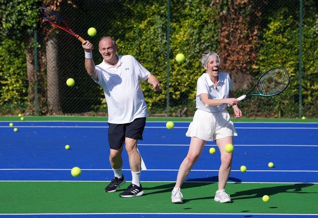 Sir Ed Davey plays tennis with deputy leader Daisy Cooper