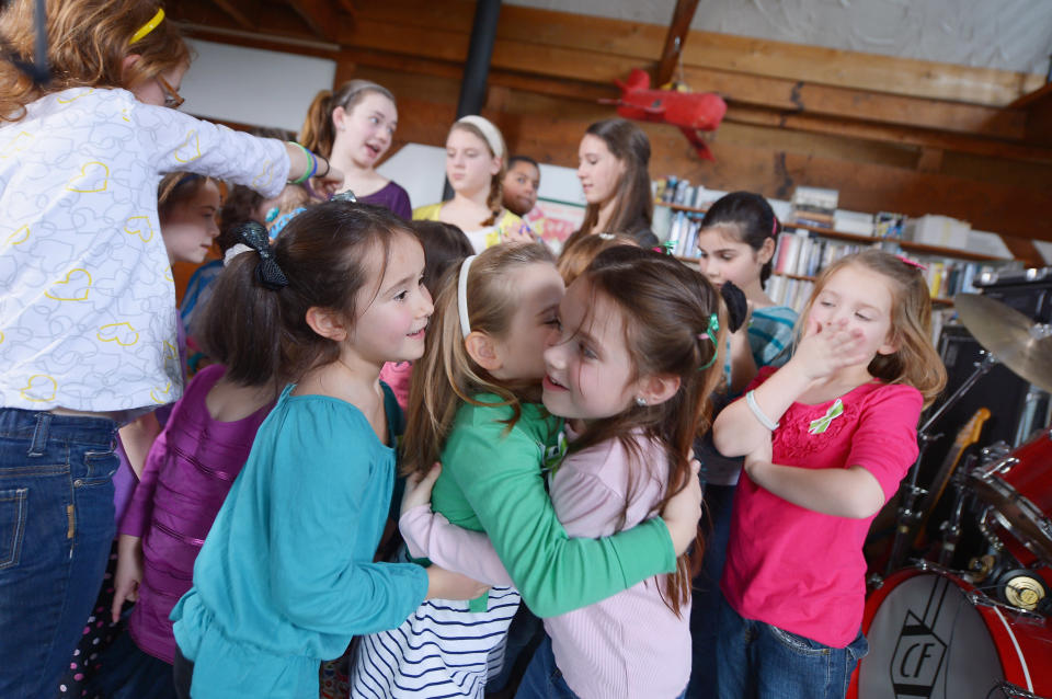 Children of Newton, CT take a break from performing "A Song From Sandy Hook" with Ingrid Michaelson at the home of Chris Frantz and Tina Weymouth of the Talking Heads on January 14, 2013 in Fairfield, Connecticut. (Photo by Michael Loccisano/Getty Images for Tim Hayes)