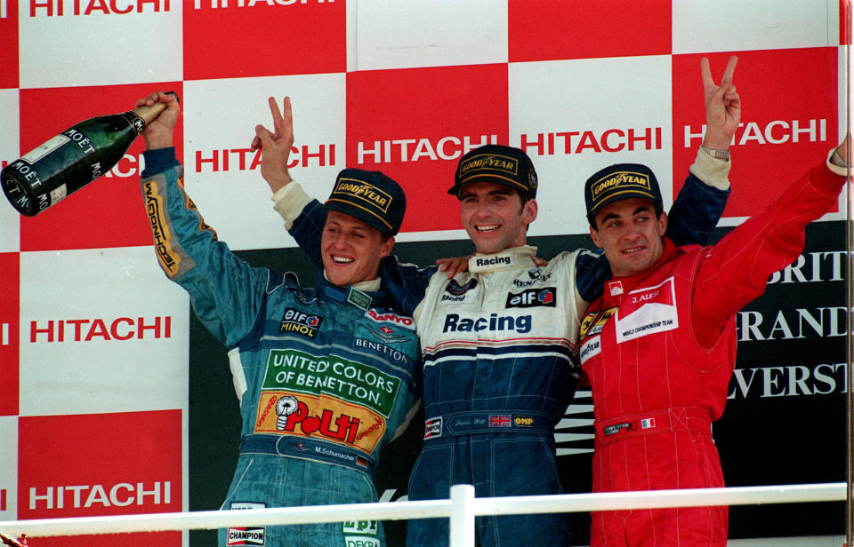 File photo dated 10-07-1994 of Britain's Damon Hill (center) on the winners Rostrum with second placed Michael Schumacher (left) and Jean Alesi after taking his Williams Renault to victory in the British Grand Prix at Silverstone.