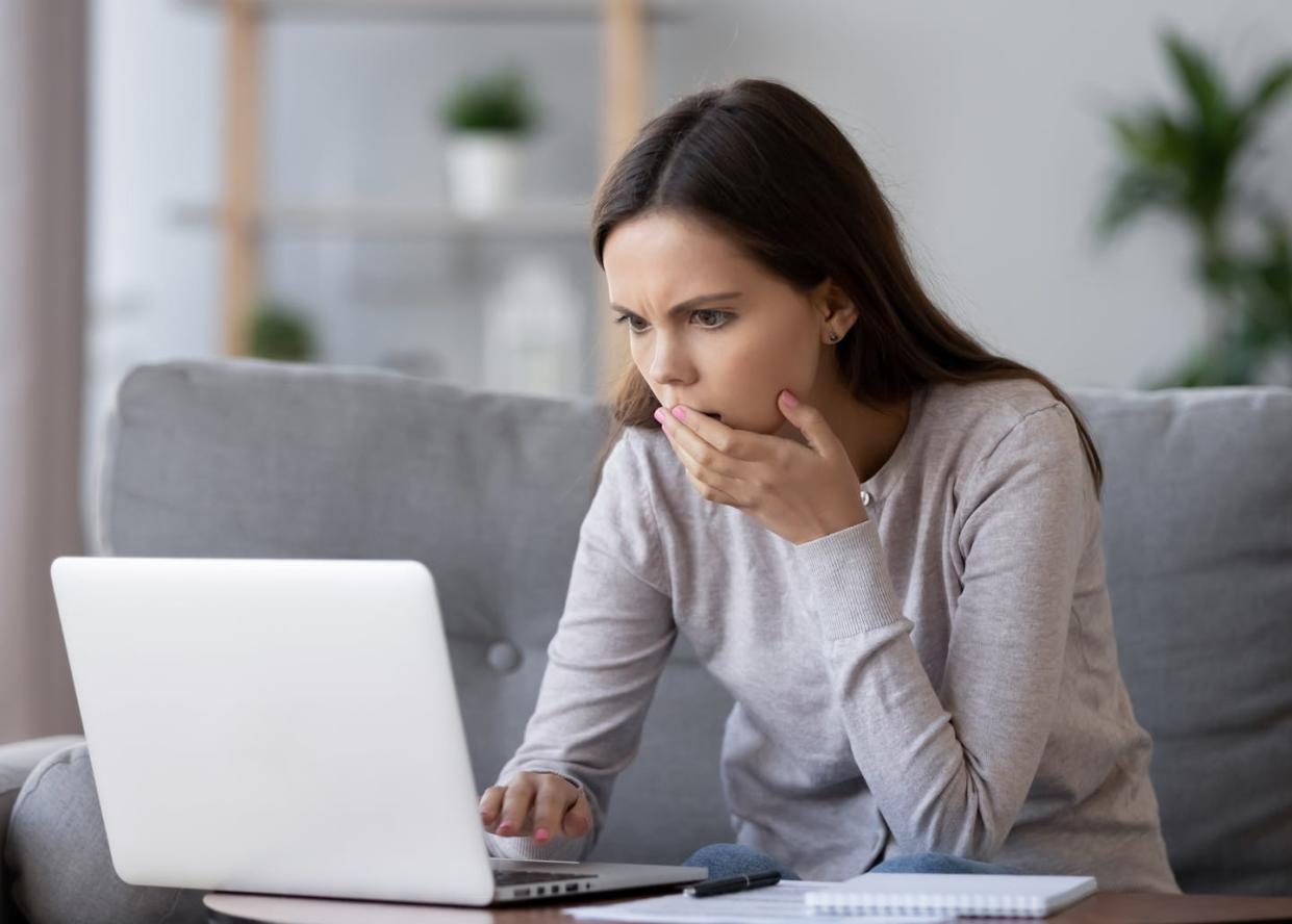 Don't end up like this person. <a href="https://www.shutterstock.com/image-photo/shocked-stressed-young-woman-reading-bad-1297544869" rel="nofollow noopener" target="_blank" data-ylk="slk:fizkes/Shutterstock.com;elm:context_link;itc:0;sec:content-canvas" class="link ">fizkes/Shutterstock.com</a>