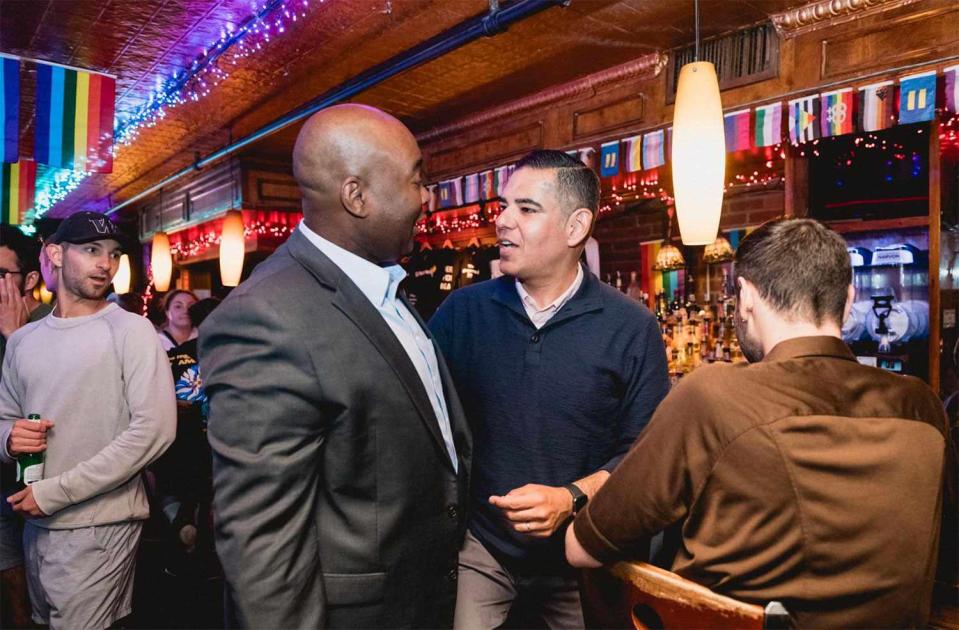 <p>Max Orenstein</p> Rep. Robert Garcia runs into DNC Chair Jaime Harrison during his conversation with PEOPLE at the Stonewall Inn on June 26, 2023