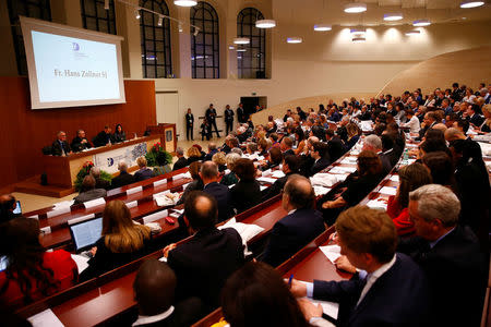 People attend the World Congress "Child Dignity in the Digital World" at the Pontifical Gregorian University in Rome, Italy October 3, 2017. REUTERS/Tony Gentile