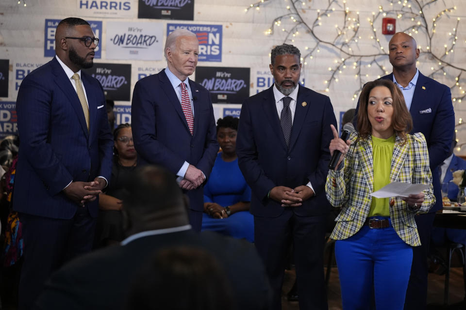 Pennsylvania Lt. Gov. Austin Davis, from left, President Joe Biden, Rep. Steve Horsford, D-Nev., and Maryland Gov. Wes Moore listen as Lynette Sutton, managing partner of Girl Concrete speaks during a visit to SOUTH Restaurant & Jazz Club, Wednesday, May 29, 2024, in Philadelphia. (AP Photo/Evan Vucci)