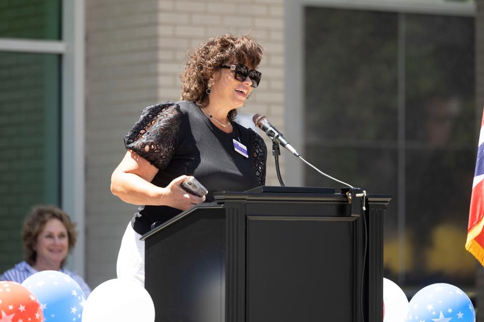 Portage County Commissioner Sabrina Christian-Bennett reads a proclamation from State Sen. Vernon Sykes during the City of Ravenna’s 225th birthday celebration held Saturday, June 8, 2024, in downtown Ravenna.