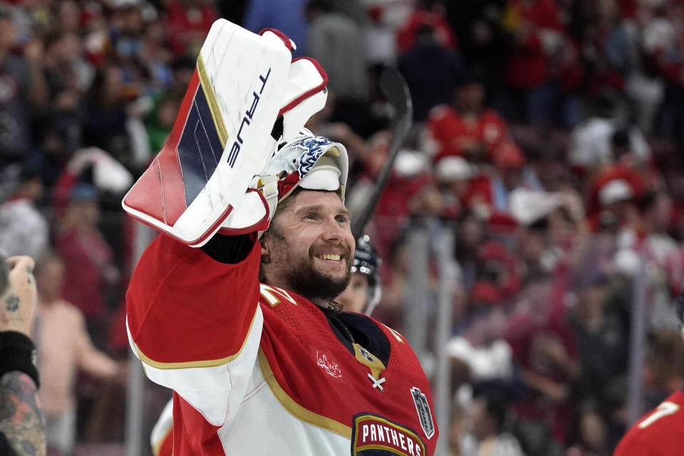 Florida Panthers goaltender Sergei Bobrovsky waves after the Panthers defeated the Edmonton Oilers in Game 1 of the NHL hockey Stanley Cup Finals Saturday, June 8, 2024, in Sunrise, Fla. (AP Photo/Wilfredo Lee)