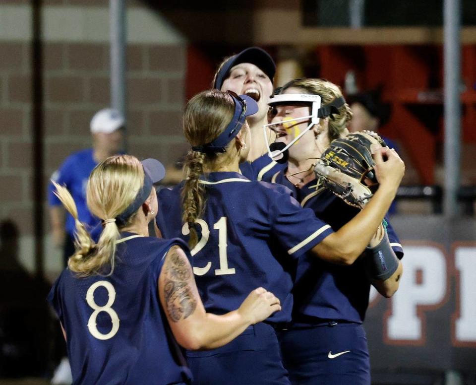 Keller pitcher Sadie Beck is swarmed by Lauren Kavanaugh and Mackenna Jackson during a UIL District 6A Region1Semi-finals at Coppell Softball Complex in Coppell, Texas, Friday, May 17, 2024.