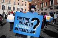 Demonstrators protest against restrictive measures put in place to fight COVID-19, in Rome