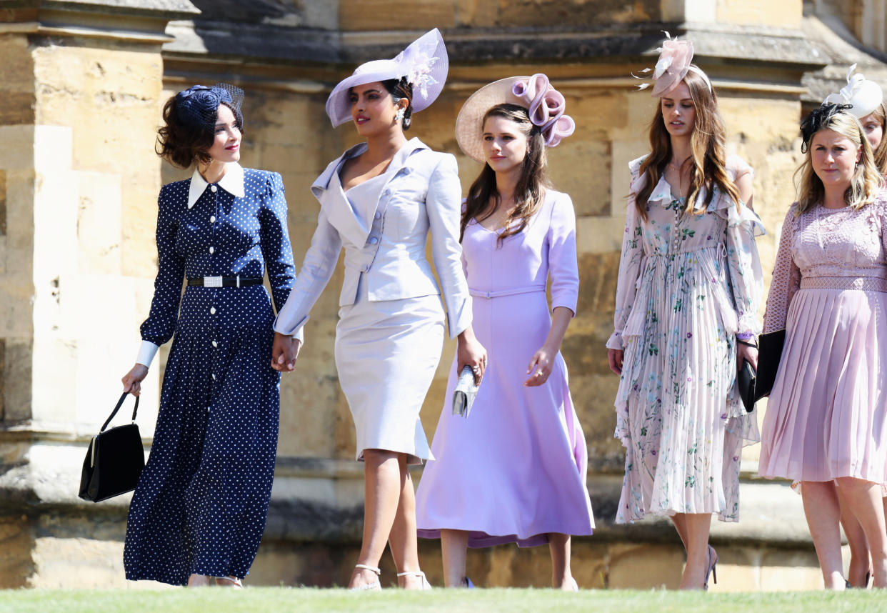 Abigail Spencer and Priyanka Chopra make their entrance. 