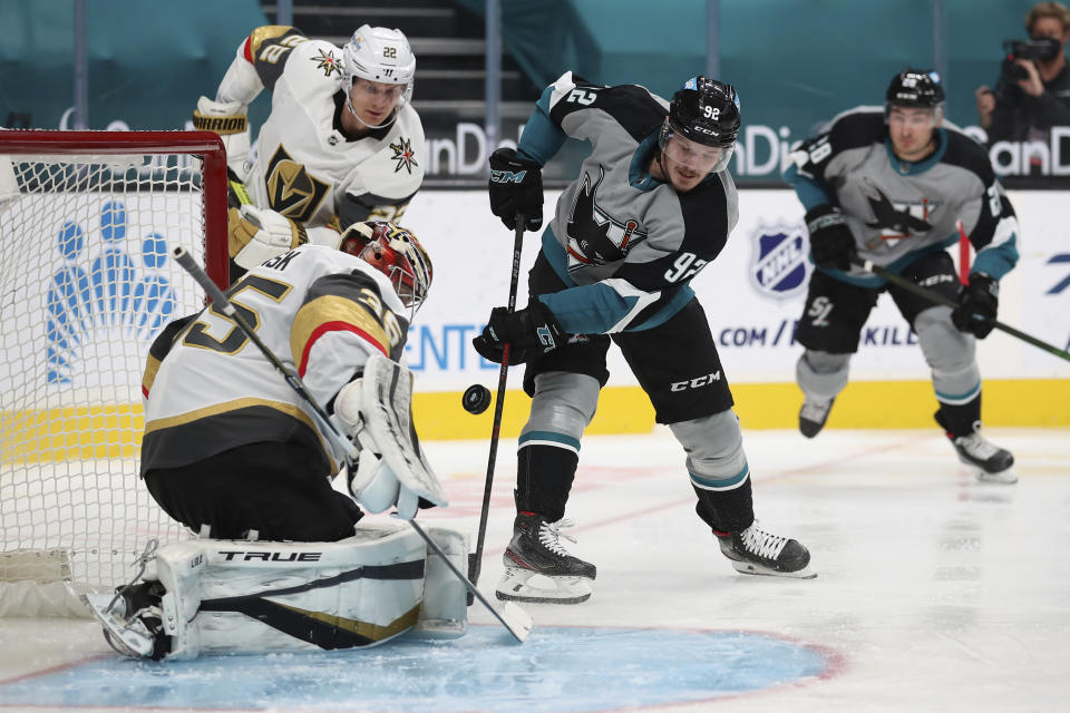 Vegas Golden Knights goaltender Oscar Dansk (35) makes a save against San Jose Sharks left wing Rudolfs Balcers (92) during the second period of an NHL hockey game in San Jose, Calif., Friday, March 5, 2021. (AP Photo/Josie Lepe)