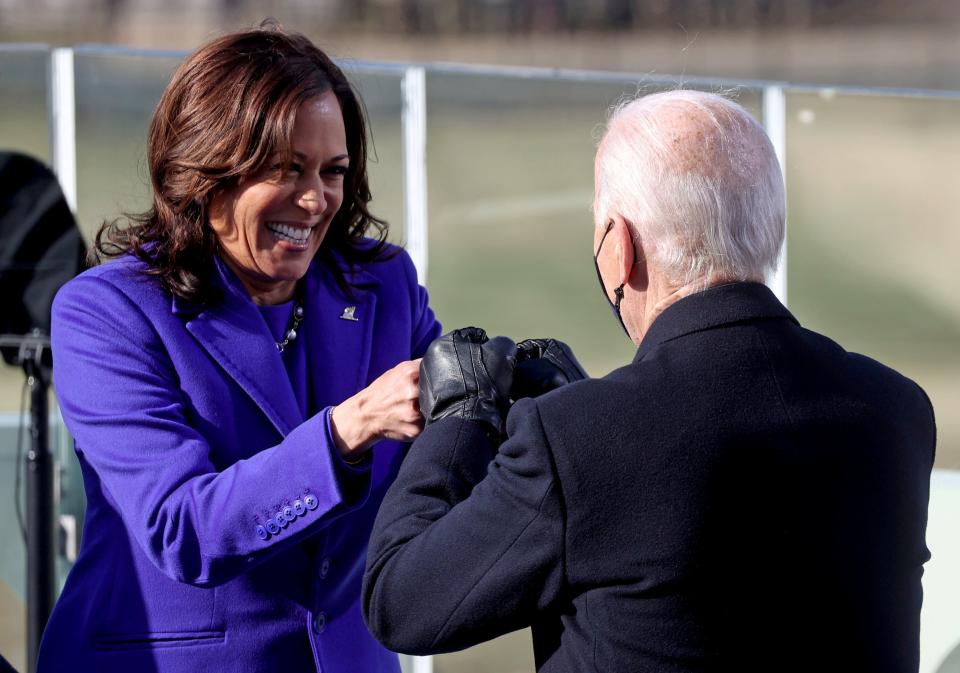 Vice president Kamala Harris celebrates with BidenReuters