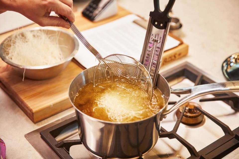 Preparation of vermicelli noodles for the fried shrimp, made at the LA Times Test Kitchen in El Segundo.