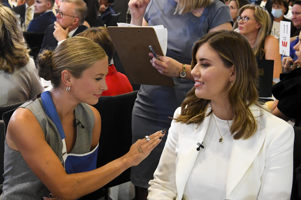 Pictured. is 2021 Australian of the Year Grace Tame (left) and advocate for survivors of sexual assault Brittany Higgins at  the National Press Club in Canberra, Wednesday, February 9, 2022