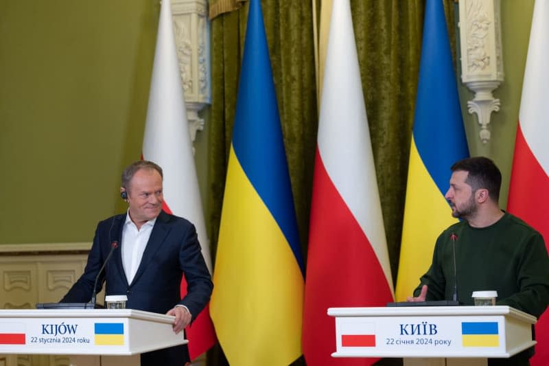 Ukrainian President Volodymyr Zelensky (R) and Polish Prime Minister Donald Tusk (L) hold a joint press conference at the Mariinskyi Palace. -/Ukraine Presidency/dpa