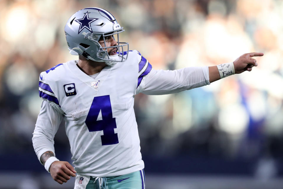 ARLINGTON, TEXAS - DECEMBER 29: Dak Prescott #4 of the Dallas Cowboys celebrates after scoring a touchdown in the second quarter against the Washington Redskins in the game at AT&T Stadium on December 29, 2019 in Arlington, Texas. (Photo by Tom Pennington/Getty Images)