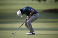 Abraham Ancer of Mexico reacts to missing a birdie put on the 10th green during the final round of the RBC Heritage golf tournament, Sunday, June 21, 2020, in Hilton Head Island, S.C. (AP Photo/Gerry Broome)