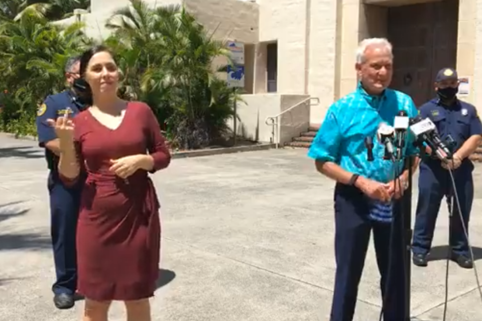 A sign language interpreter translated a man shouting 'f*** you" at the Mayor of Honolulu: Mayor Kirk Caldwell