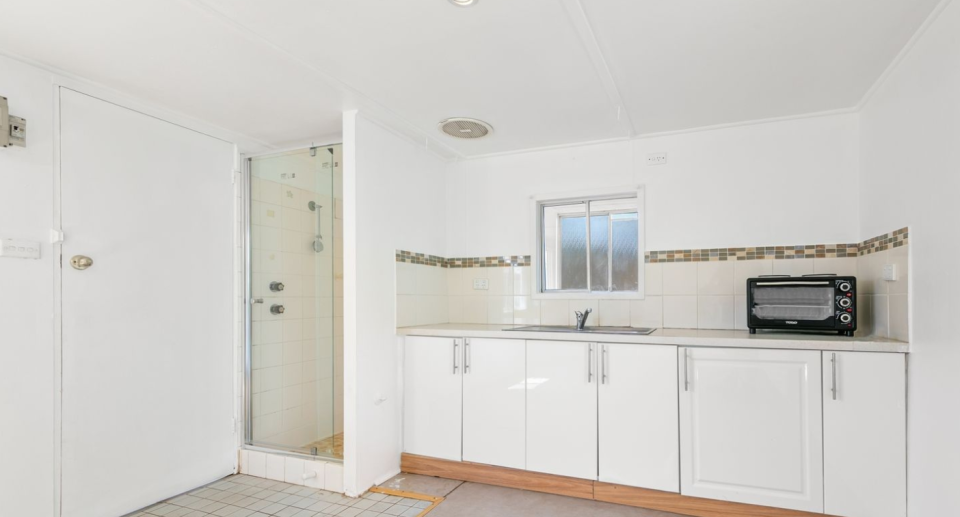 Rental with shower in kitchen