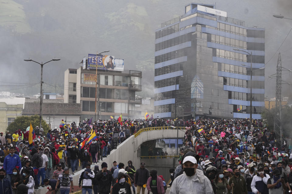 Demonstrators protest against the government of President Guillermo Lasso and rising fuel prices in Quito, Ecuador, Tuesday, June 21, 2022. Ecuador's defense minister warned Tuesday that the country's democracy was at risk as demonstrations turned increasingly violent in the capital. (AP Photo/Dolores Ochoa)