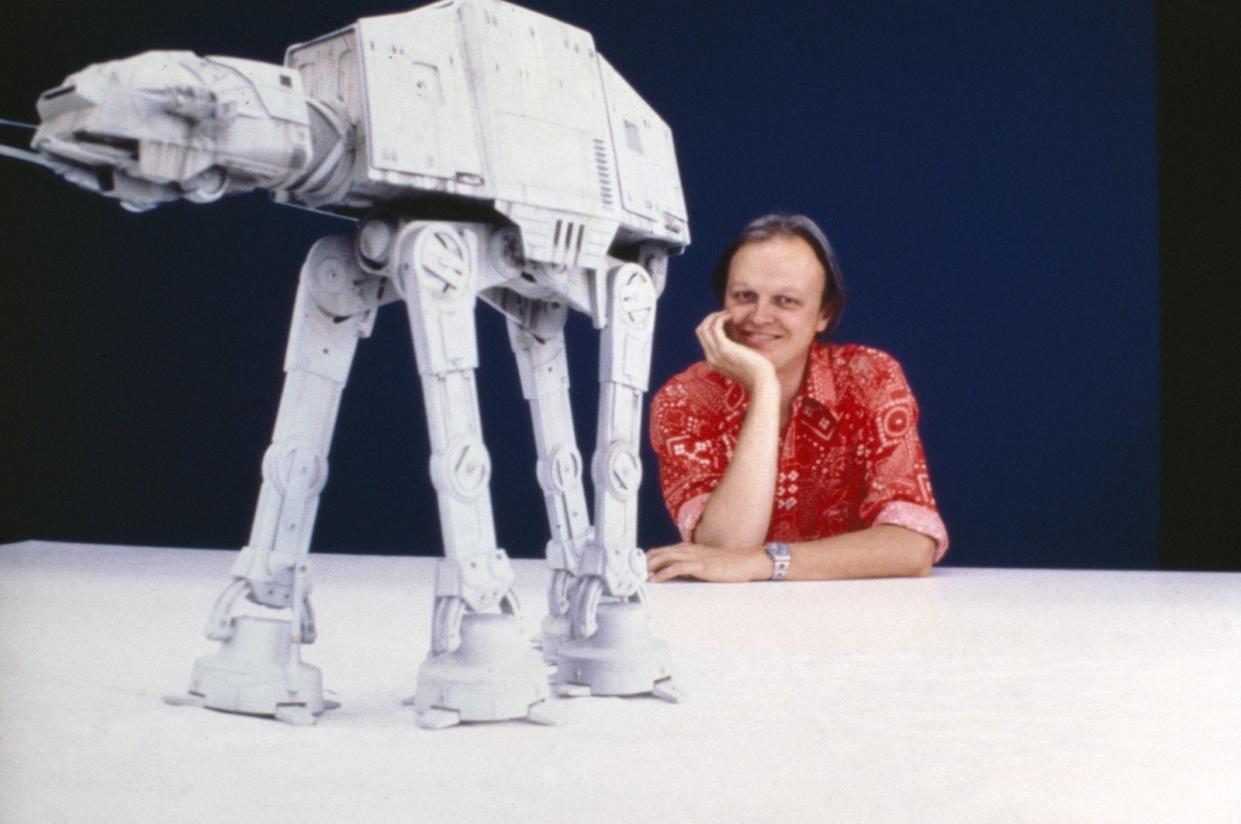 Dennis Muren poses with an AT-AT walker behind the scenes of 'The Empire Strikes Back' (Photo: Lucasfilm) 