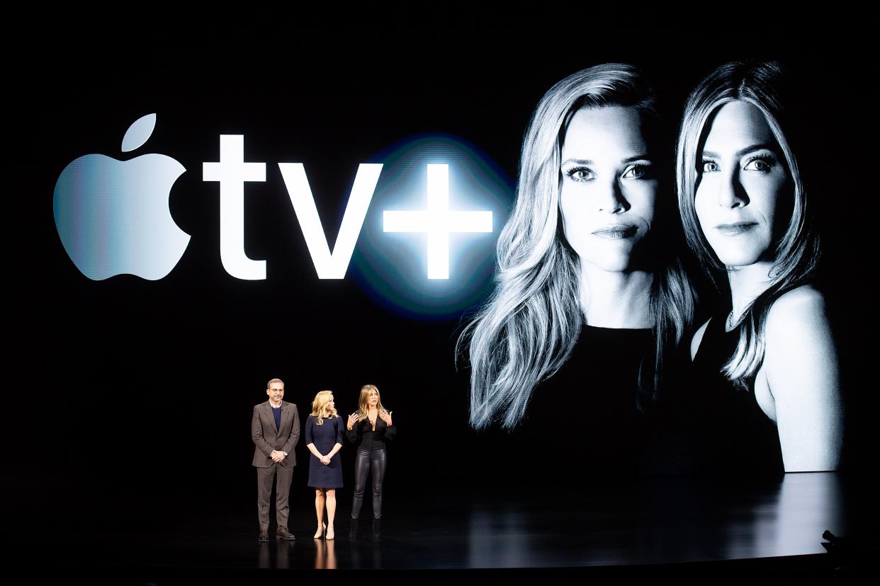 Actors Steve Carell, Reese Witherspoon and Jennifer Aniston speak during an event launching Apple tv+ at Apple headquarters on March 25, 2019, in Cupertino, California. (Photo by NOAH BERGER / AFP)        (Photo credit should read NOAH BERGER/AFP/Getty Images)