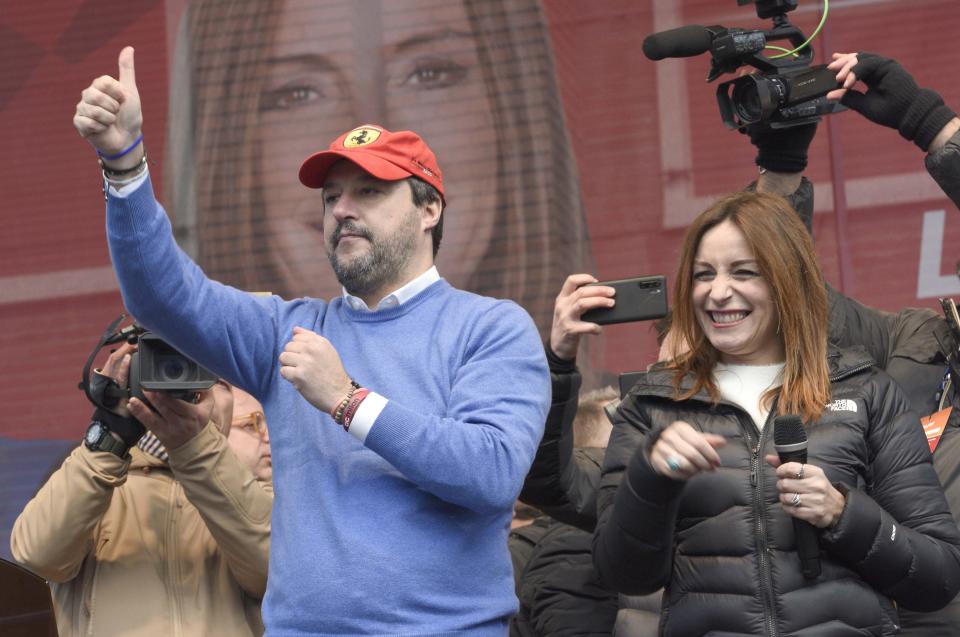 League's leader Matteo Salvini, flanked by party candidate Lucia Borgonzoni, gestures during a campaign rally in view of the upcoming local elections in the Emilia Romagna region, in Maranello, Italy, Saturday, Jan. 18, 2020. (Stefano Cavicchi/LaPresse via AP)