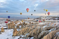 <p>Cappadocia, Turkey, is famous for its chimney rocks, hot air balloon tours, underground cities and boutique hotels carved into rocks. World Heritage site since 1985. (Photo: Murat Oner Tas/Anadolu Agency/Getty Images) </p>