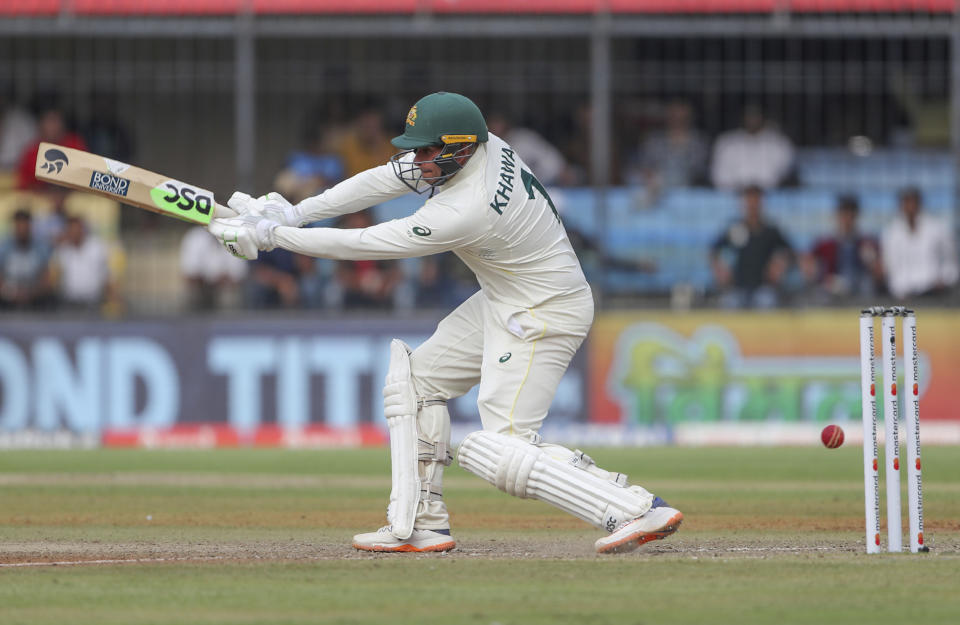 Australia's Usman Khawaja plays a shot plays a shot during the first day of third cricket test match between India and Australia in Indore, India, Wednesday, March 1, 2023. (AP Photo/Surjeet Yadav)