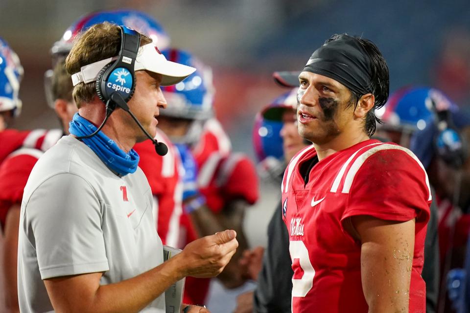 Quarterback Matt Corral talks with Ole Miss head coach Lane Kiffin during a Sept. 18, 2021 game.