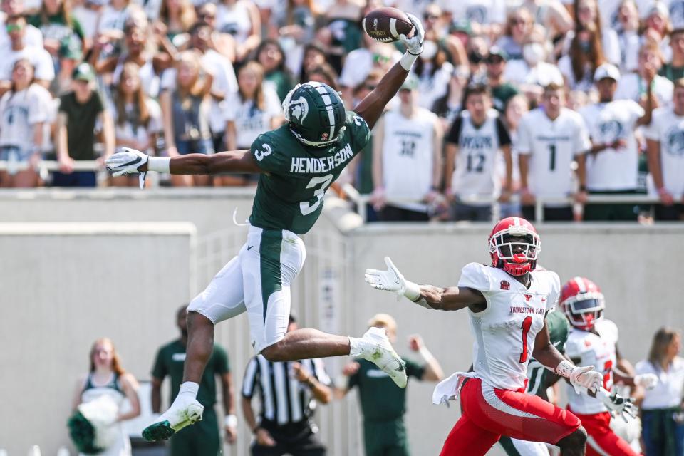 Michigan State's Xavier Henderson intercepts the ball intended for Youngstown State's Samuel St. Surin during the second quarter on Saturday, Sept. 11, 2021, at Spartan Stadium in East Lansing.