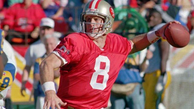 Quarterback Steve Young of the San Francisco 49ers throws a pass