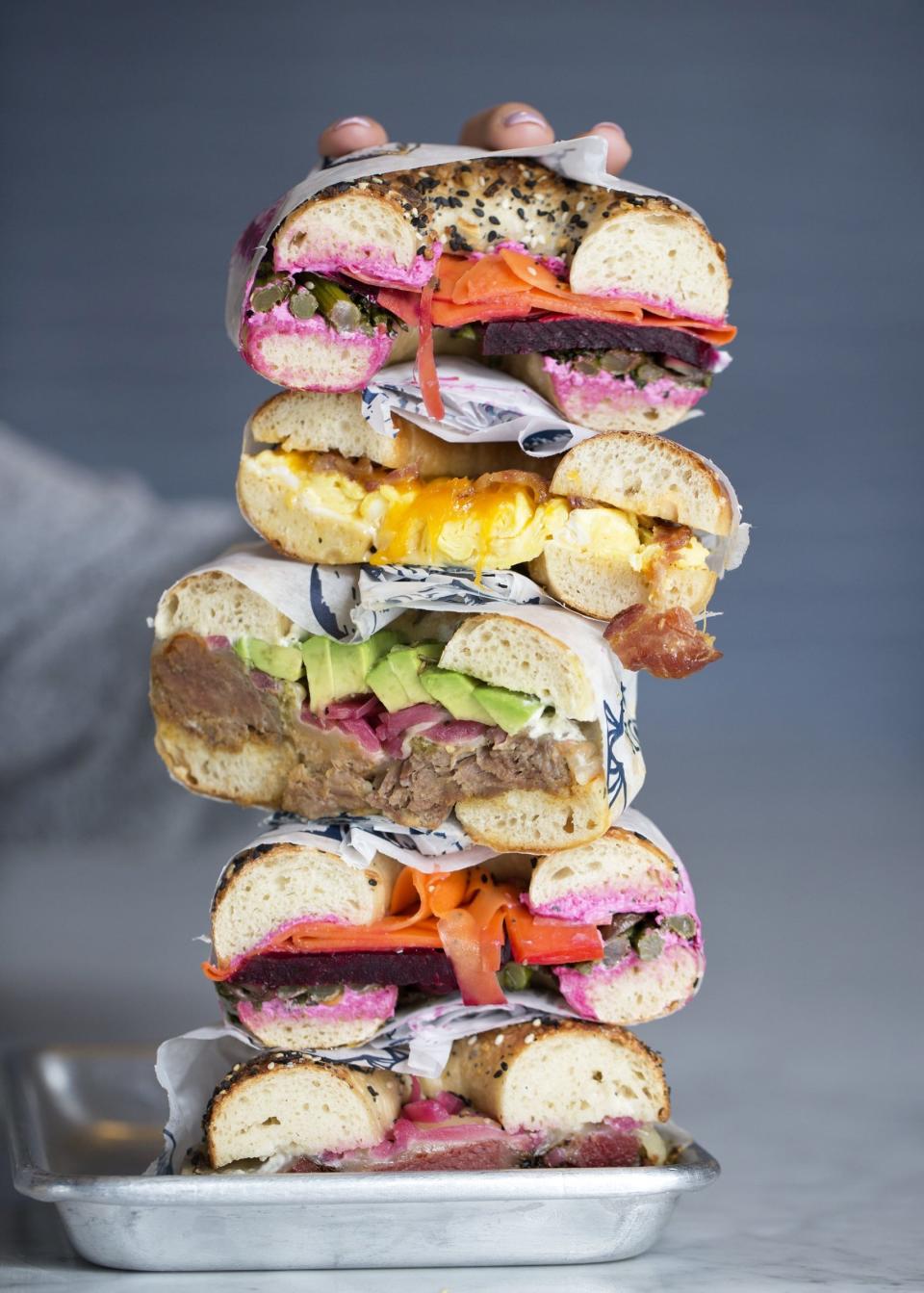 Bagels featuring, from top, veggies, egg and cheese with sausage, pork, veggies again and pastrami at The Lox Bagel Shop [TIM JOHNSON/ALIVE]