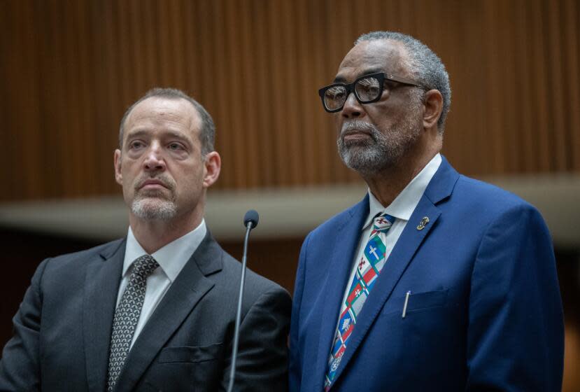 LOS ANGELES, CA - JULY 13: Los Angeles City Councilmember Curren Price, right, and his attorney David Willingham appear in court on Thursday, July 13, 2023. His arraignment was continued to August. Price is charged with embezzlement of government funds, perjury and conflict of interest. (Myung J. Chun / Los Angeles Times)
