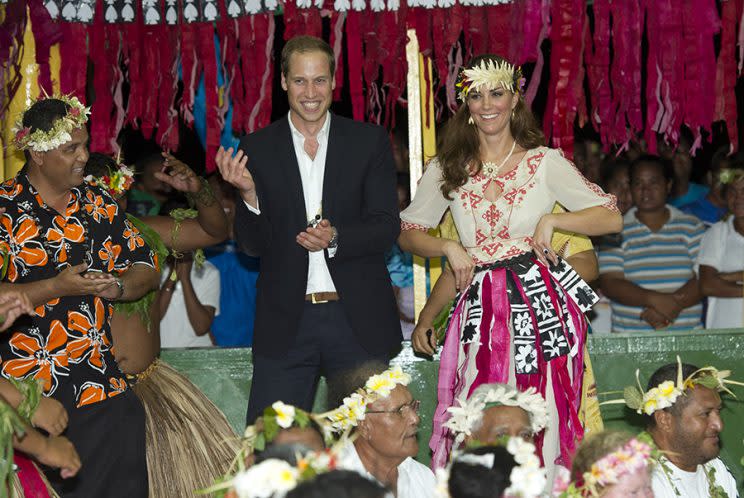 Catherine, Duchess of Cambridge, and Prince William, Duke of Cambridge, dance during the Diamond Jubilee tour in 2012. (Photo: Getty Images)